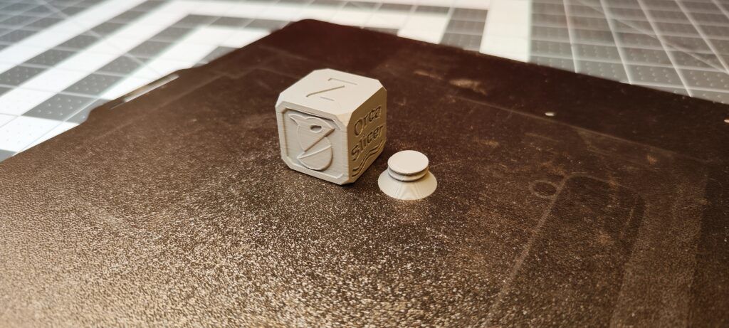 A calibration cube with dimensional labels to show accuracy.
